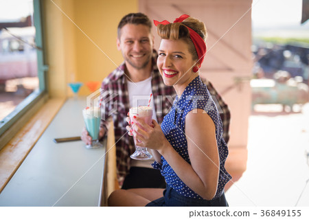 Couple romancing in restaurant 36849155
