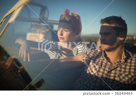 Couple sitting together in a car Couple sitting together in a car 36849465