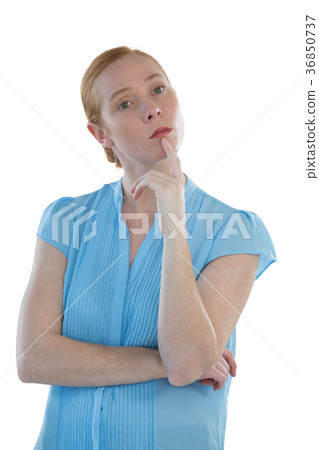 Female executive standing against white background Female executive standing against white background 36850737