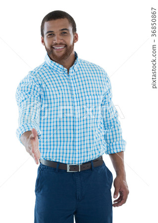 Male executive offering handshake against white background 36850867