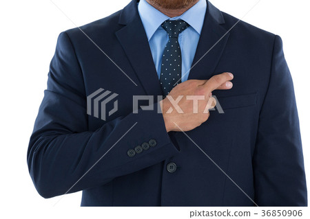 Businessman holding his finger crossed Businessman holding his finger crossed 36850906