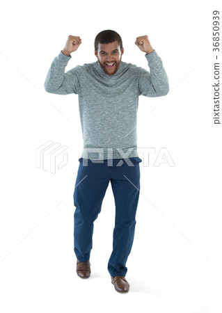 Male executive standing against white background Male executive standing against white background 36850939