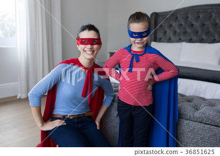 Mother and daughter pretending to be superhero 36851625