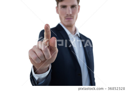 Businessman pretending to use an invisible screen Businessman pretending to use an invisible screen 36852328