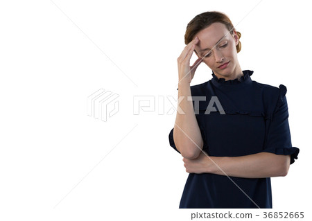 Female executive standing against white background 36852665