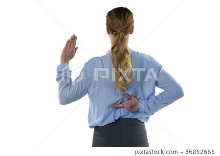 Female executive gesturing against white background Female executive gesturing against white background 36852668