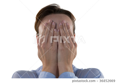 Female executive covering his face Female executive covering his face 36852669