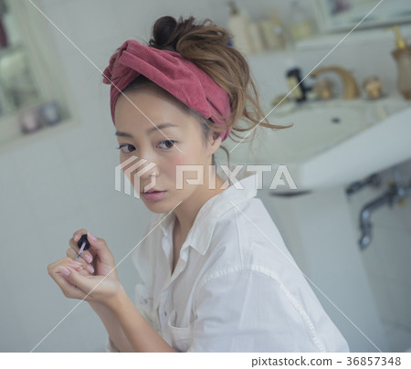 Woman enjoying nail image 36857348