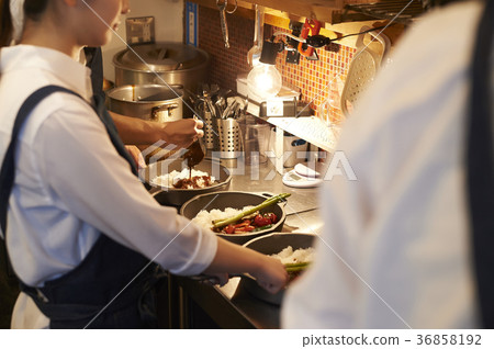 Cafe kitchen staff cooking 36858192