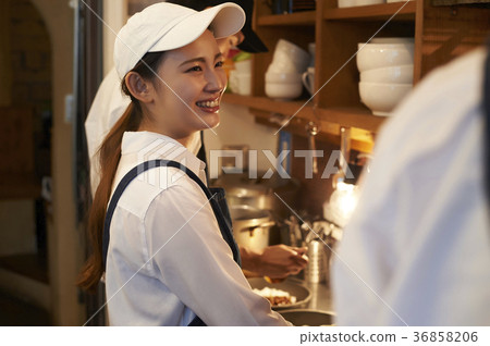 Cafe kitchen staff cooking Cafe kitchen staff cooking 36858206