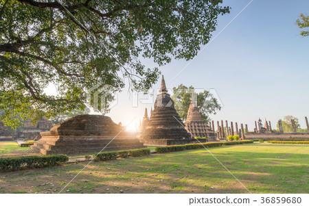 Sukhothai historical park with sunrise. 36859680