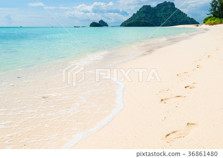 footprints on the white sand in Thailand Poda footprints on the white sand in Thailand Poda 36861480
