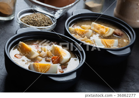 The sour soup made of rye flour with eggs 36862277