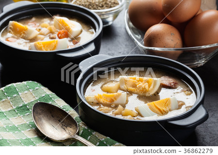 The sour soup made of rye flour with eggs 36862279