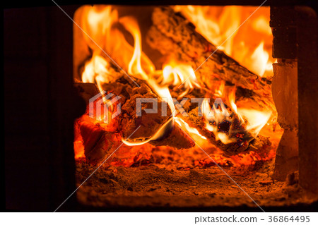 Fire and coals in fireplace furnace 36864495