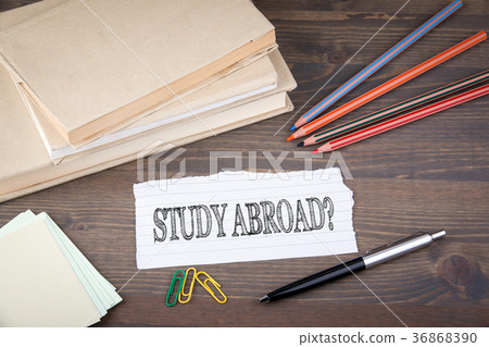 Study Abroad. Paper sheet from the booklet on the wooden table 36868390
