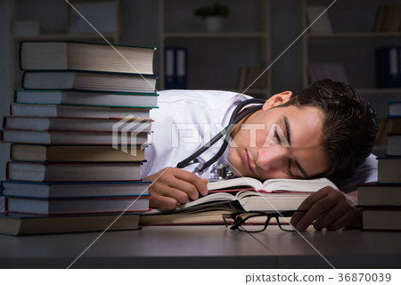 Medical student preparing for university exams at 36870039