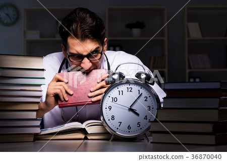 Medical student preparing for university exams at 36870040
