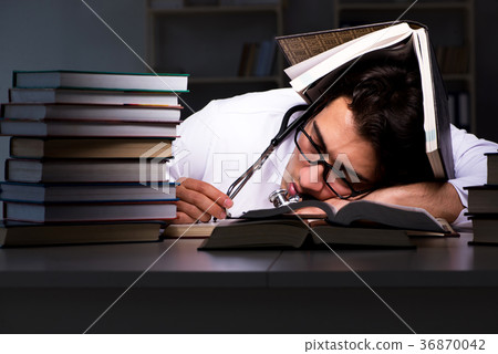 Medical student preparing for university exams at 36870042