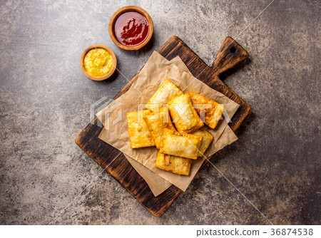 Fried cheese empanadas. Traditional Latin American Fried cheese empanadas. Traditional Latin American 36874538
