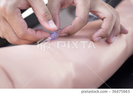 injection or iv by syringe training on model arm injection or iv by syringe training on model arm 36875663