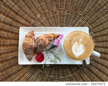 top view of hot coffee with croissant top view of hot coffee with croissant 36875673