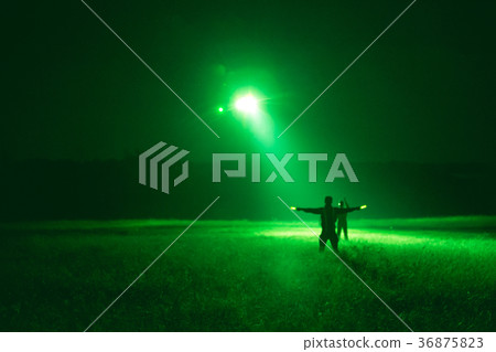 marshaller signal to helicopter night landing  36875823