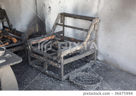 chair and furniture after burned by fire 36875994