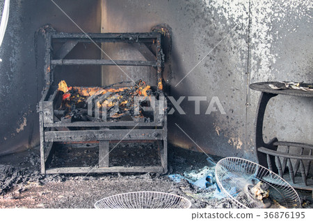 chair and furniture after burned in burn scene 36876195
