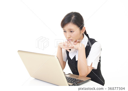 Tired business looking woman 36877304