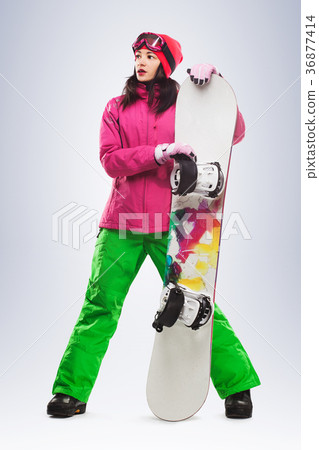 Girl with snowboard in studio on isolated 36877414