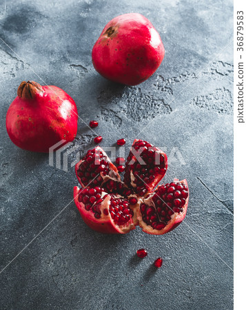 Pomegranate on dark background. Flat lay, top view Pomegranate on dark background. Flat lay, top view 36879583