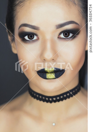 Fashion makeup. Woman with colorful makeup and Fashion makeup. Woman with colorful makeup and 36884754