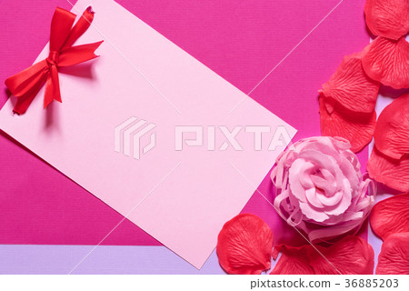 Message card with bow and rose petals Message card with bow and rose petals 36885203