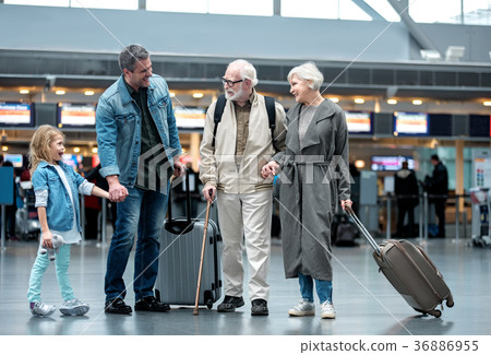 Happy family are waiting for their flight Happy family are waiting for their flight 36886955