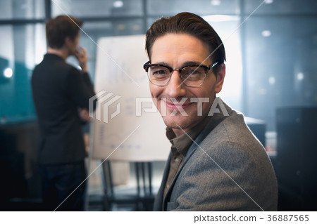 Cheerful man locating at presentation 36887565