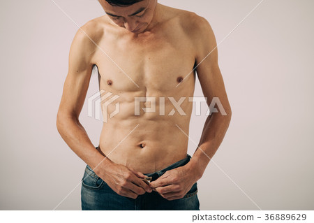 Middle-aged man diet with split abs 36889629