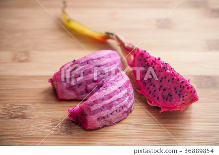 cutted pitaya fruit on wooden cutting board cutted pitaya fruit on wooden cutting board 36889854