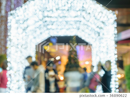 People with colorful Christmas lights People with colorful Christmas lights 36890622