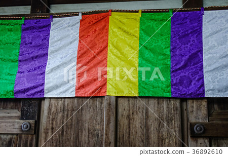 Buddhist flag at a wooden temple Buddhist flag at a wooden temple 36892610