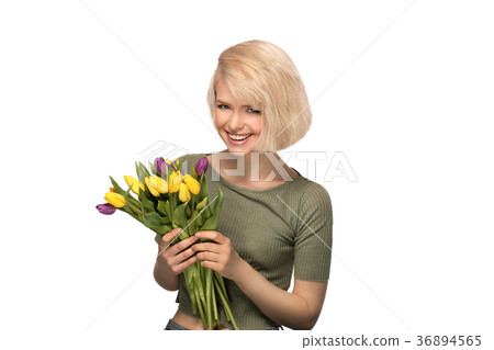 Woman holding a bouquet of tulips Woman holding a bouquet of tulips 36894565
