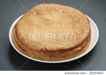 homemade crepes on plate on slate board 36894665