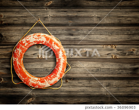 lifebuoy at wooden background 36896903