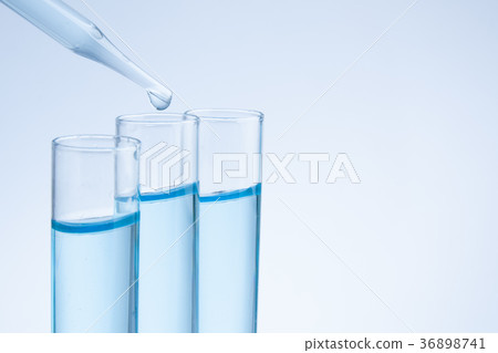 Substance over laboratory test tubes 36898741