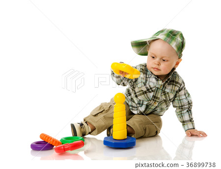 boy collecting pyramid boy collecting pyramid 36899738