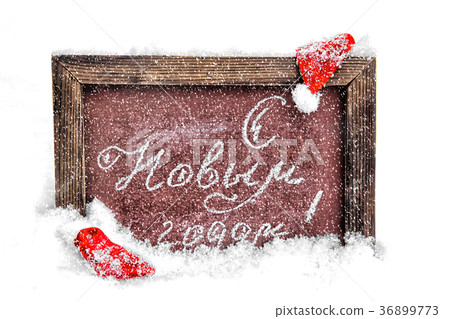 A school board with a festive inscription, a New 36899773