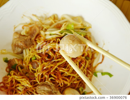 pork ball picking in white plastic chopstick pork ball picking in white plastic chopstick 36900076