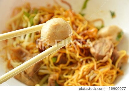 pork ball picking in white plastic chopstick pork ball picking in white plastic chopstick 36900077