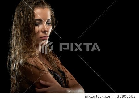 Attractive young model posing at studio 36900592
