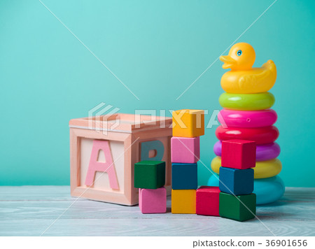 Baby toys on wooden table 36901656
